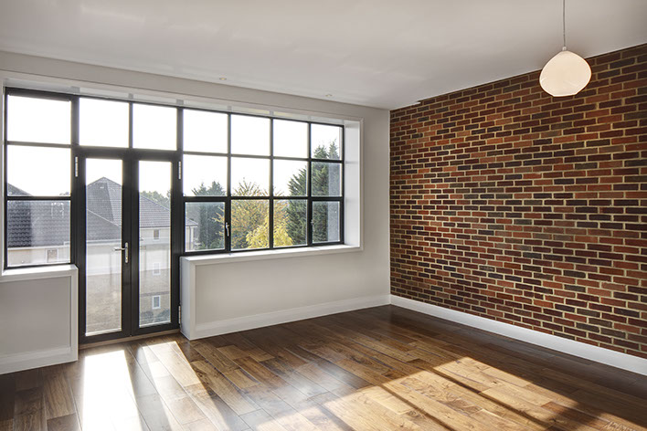 The Lofts Industrial loft development. Loft-style windows and exposed brick